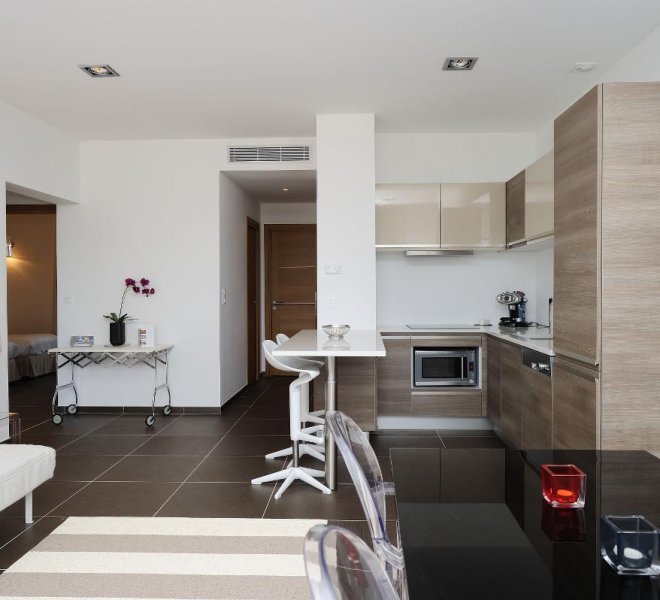 Salon/cuisine appartement n°20 hôtel spa le Pinarello à Porto-Vecchio